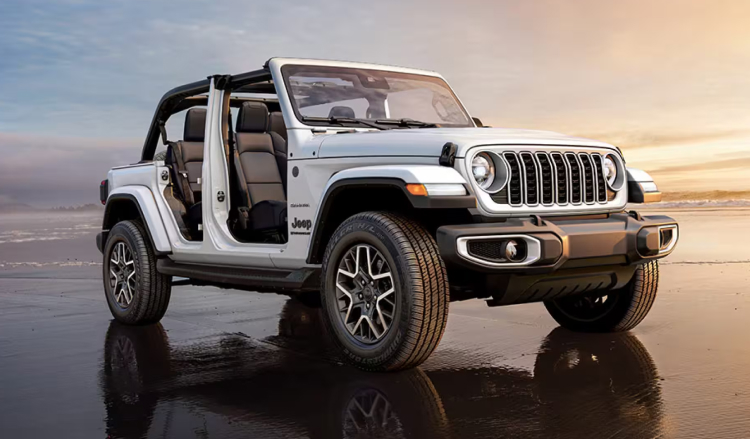 White Jeep Wrangler parked on the beach
