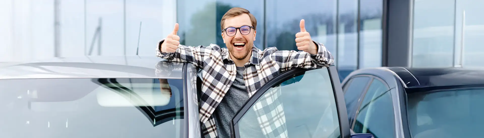 First Time Buyer driving off in her new vehicle